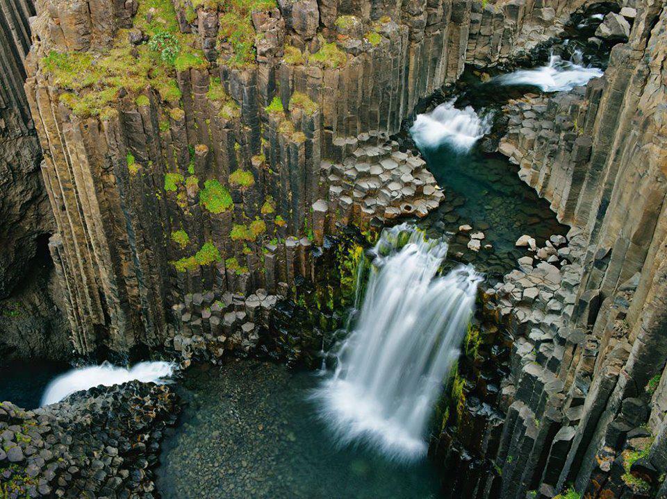 Litlanesfoss - Iceland, waterfall crosses ancient lava flow, which formed columns as it cooled, by Wild Wonders of Europe