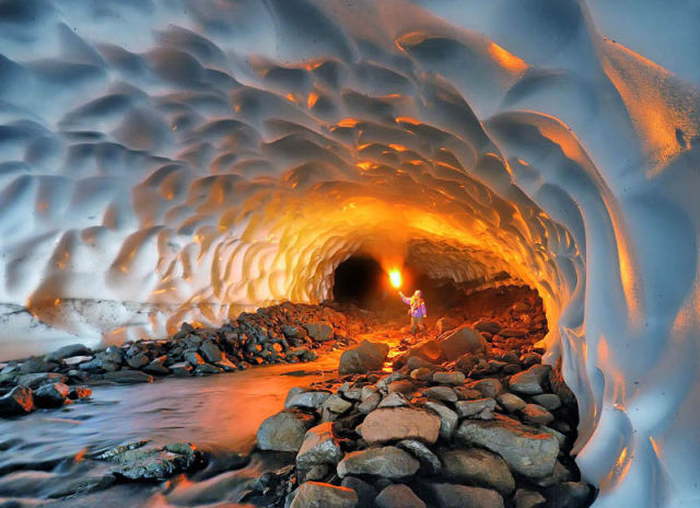 Illuminated snow tunnel in Russia