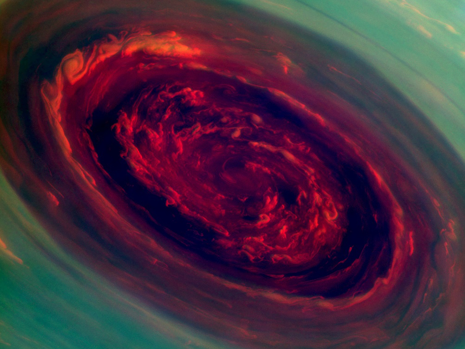 A cyclone over Saturn from NASA's Cassini mission from approximately 224,618 miles away. The eye is a staggering 1,250 miles (2,000 kilometers) across with cloud speeds as fast as 330 miles per hour (150 meters per second).