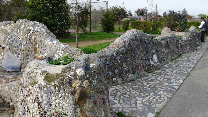 Andrew Werby designed the wall and bench inspired by Gaudi’s tile wall in Park Güell, Barcelona.