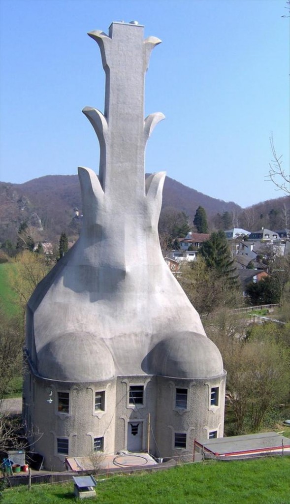 Designed by Rudolf Steiner in Dornach, Switzerland, the building contains the boiler for the hot water heating system including the chimney.